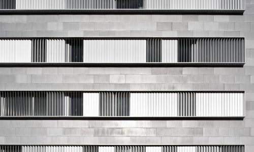 Facultad de Ciencias de la Educación en Sevilla Diseño de huecos y carpinterias de brise soleil de aluminios de fachada exterior de Cruz y Ortiz Arquitectos