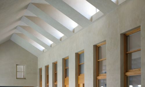 Lofts en Fabrica de Sabadell en Barcelona Diseño de fachada interior galería y lucernario de cubierta de Cruz y Ortiz Arquitectos
