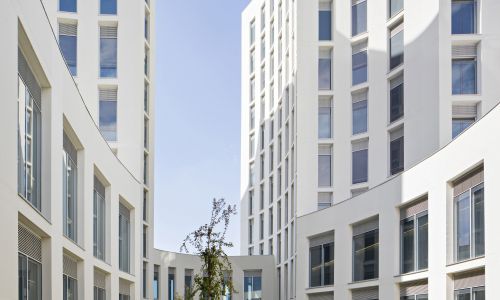 Facultad-Medicina-Campus-salud-Universidad-UGR-Granada_Design-exterior-patio-torres-hormigon_Cruz-y-Ortiz-Arquitectos_JCA_37-X